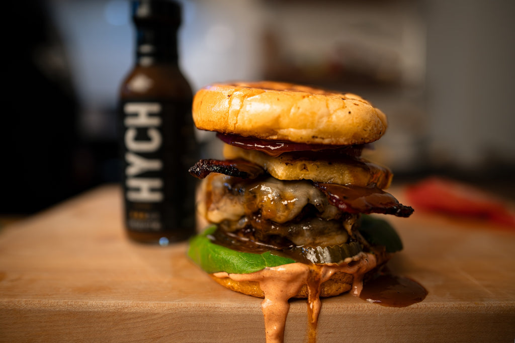 Messy Burger made with HYCH Pineapple Hot Sauce