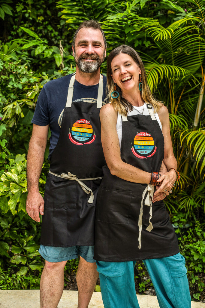Matt and Catharine in Costa Rica in retreat aprons smiling